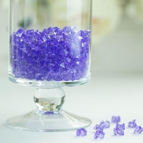 $4.99 | Bedazzle your guests with these mesmeric clear acrylic crystals that mimic the elegance of real ice and provide the wonderful choice of lurid hues to match with your party ambiance. Glamorize your ambiance by accentuating the reception tables, centerpieces, vases, terrariums or favor bags with these sparkling ice crystals. Just scatter around the champagne station for instant excitement. These beautiful crystal clear display fake ice pieces are ideal for a variety of displays. Moss Table Runner, Wedding Table Centerpieces Diy, Table Centerpieces Diy, Purple Vase, Oblong Tablecloth, Wedding Expenses, Ice Crystals, Christmas Events, Diy Centerpieces