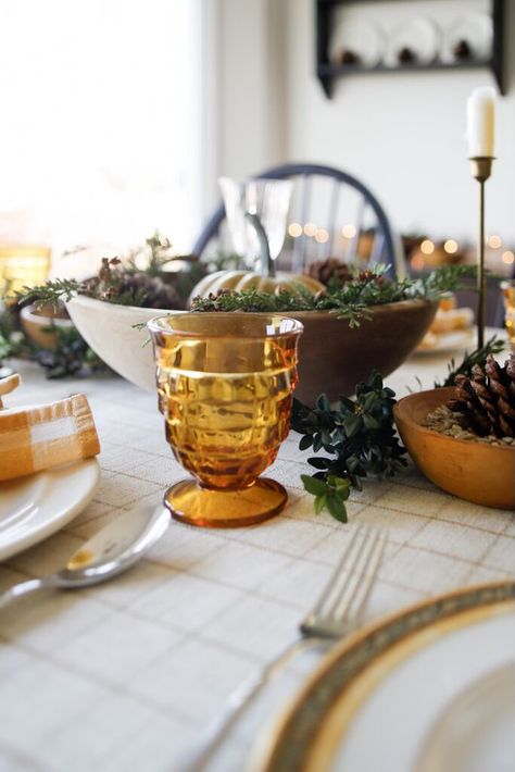 Thanksgiving table set with vintage amber glass and decorative wooden bowls. Cozy Thanksgiving, Thrifted Decor, Thanksgiving Tablescape, Thanksgiving Tablescapes, Cozy Farmhouse, Thanksgiving Decor, Thanksgiving Table, Natural Elements, Thanksgiving Decorations