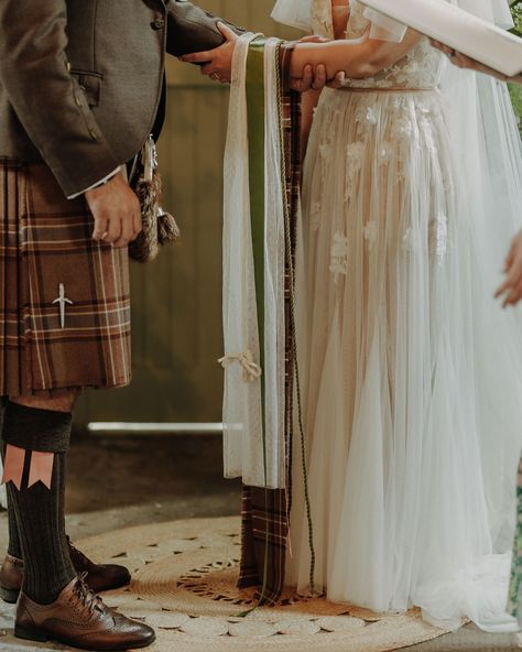 HANDFASTING What’s handfasting? It’s probably the most popular Scottish wedding tradition alongside the quaich. It originated in ancient Celtic times and it was a way to get people married. Simply by tying their hands with a piece of fabric from the bride’s skirt and groom’s tartan. Nowadays this tradition is still very much alive, however the form varies and it purely depends on the couple who is getting married. Hands can be tied with tartans, ropes, lace ribbons, anything what couple ... Married Hands, Scottish Wedding Traditions, Very Much Alive, Celtic Wedding, Scottish Wedding, Lace Ribbon, Getting Married, Elopement, Tartan