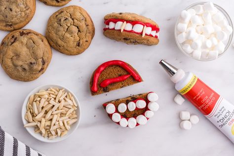 These Vampire Teeth Cookies are a spooky treat you can really (ahem) sink your teeth into. Super cute and easy to make! Teeth Cookies, Dracula Teeth, Red Food Dye, Family Fresh Meals, Vampire Teeth, Cookie Dough Recipes, Kinds Of Cookies, Spooky Treats, Food Dye