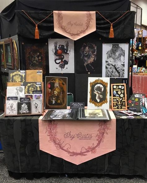 Shy Custis on Instagram: "Day 2 at @gen_con, table 81 in the art show! ✨ A new specialty item is debuting at the show before going live on the shop. Can you spot them? 👀 Patreon subscribers already got the first look & will get first dibs once they’re online! Patreon.com/ShyCustis" Fair Table Display Ideas, Art Market Booth, Art Market Display, Art Festival Booth Display, Festival Booth Display, Art Festival Booth, Convention Booth, Art Booth, Art Fair Booth