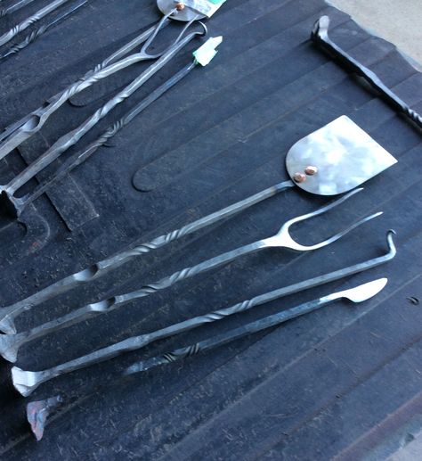 Blacksmith BBQ tools from rail spikes, flipper, fork,steak turner and knife . Made for craft sale in Oct. Dog Yard Forge and Metalworks Forged Bbq Tools, Railroad Spikes Crafts, Blacksmith Ideas, Forging Tools, Fire Pokers, Blacksmith Forge, Diy Bbq, Dog Yard, Metal Fab