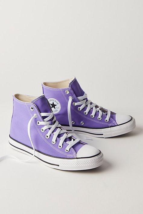 **Fit:** This style is in unisex sizing so a men's size 4 is a women’s size 6. Classic canvas high top Chuck Taylors. | Chuck Taylor All Star Hi Top Converse Sneakers at Free People in Purple, Size: US 5.5 M Converse Shoes Light Purple, Converse Shoes Purple, Purple Converse Aesthetic, Cute High Top Shoes, Purple Converse Outfit, Bright Converse, Pastel Converse, Lilac Converse, Lavender Converse