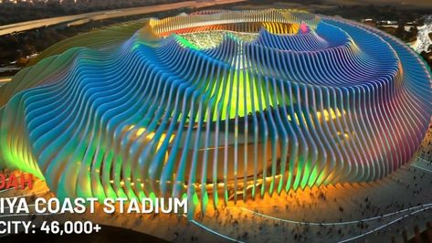 Future Qiddiya Coast Stadium Capacity 46,096 Opening 2032 City Jeddah Country Saudi Arabia The Qiddiya Coast Stadium will be a new stadium with a capacity of more than 45,000. It is designed as a physical representation of the vibrant relationship between people and water, energy and matter, with its design also evoking the ripple effect of a “Mexican wave.” Its form undulates; its vibrant color palette is rich and joyful. It will be located in the northern part of Jeddah on the shore of th... Mexican Wave, The Ripple Effect, Football Pitch, Water Energy, Ripple Effect, Football Stadiums, Red Sea, Jeddah, Fifa World Cup