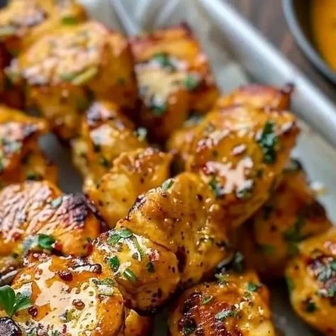 Just zarina on Instagram: "Cowboy Butter Chicken Skewers🍗🌿 Credits @conercusine @homemade_addict2  Recipe Ingredients: 8 wooden skewers, soaked in water for 30 minutes 2 boneless skinless chicken breasts (about 1 pound), cut into 1-inch cubes 1 tablespoon extra virgin olive oil 1 teaspoon kosher salt ½ teaspoon black pepper ½ cup cowboy butter, melted Fresh parsley, chopped for garnish Directions: In a large bowl, combine chicken, oil, salt, and pepper. Toss to coat thoroughly. Thread 4-5 chicken cubes onto each soaked skewer, ensuring a small space between each cube. Air fry at 400°F for 11-12 minutes, flipping halfway through, until chicken reaches an internal temperature of 165°F. Remove the skewers from the air fryer and arrange on a serving platter. Generously drizzle or brush with Cowboy Butter Chicken Skewers, Butter Chicken Skewers, Cowboy Butter Dipping Sauce, Butter Dipping Sauce, Chicken Cubes, Cowboy Butter, Garlic Mustard, Wooden Skewers, Chicken Skewers