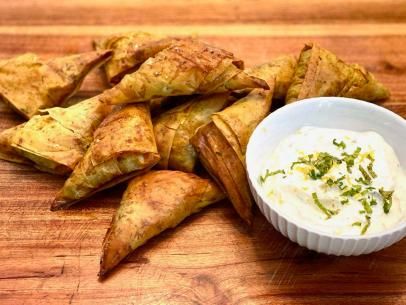 Yogurt Dipping Sauce, Jamaican Curry, Carla Hall, Hand Pie Recipes, Sweet Potato Curry, Hand Pie, Yogurt Dip, Pastry Pie, Potato Curry