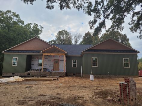 Lakeshore fern vertical siding, red cedar shake, stone will be added on porch Green Board And Batten Exterior, Green Siding, Cedar Shakes, Vertical Siding, Board And Batten Siding, Board And Batten, Red Cedar, Future House, Porch