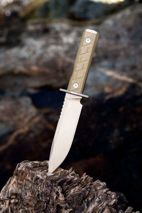 The Zero Tolerance 0006 survival knife sticking out of a log next to a mountain creek. Knife Photography, Tactical Survival, Hiking Adventure, Outdoor Knife, Easy Camping, Zero Tolerance, Leather Ring, Ring Handle, Knife Design