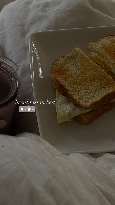 Egg sandwich on a white plate in white bed sheets with text breakfast in bed and home. Breakfast Aesthetic Caption, Lunch Ig Story Ideas, Bed Captions Instagram, Sunday Breakfast Aesthetic, Lunch Time Instagram Story, Cozy Instagram Stories, Breakfast Aesthetic Mornings Instagram, Breakfast Story Ideas, Breakfast Instagram Story Ideas