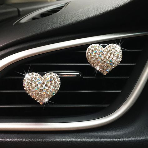 PRICES MAY VARY. ✔ Glitz Car Interior Accessory: the package contains 2 pieces cute and glitter bling heart car air outlet clips, with 2 pack solid fragrance replacement pads; fashionable lover heart style design with sparkly rhinestone add aesthetic and romantic atmosphere to your car, delightful scent to your ride, make every trip more enjoyable. ✔ Well Made & Detailed: theses bedazzled crystal car clips for men women teens are made of high-quality alloy and gorgeous rhinestones. The workmansh Car Girl Gifts, Solid Fragrance, Bling Car, Girl Gift Baskets, Interior Decoration Accessories, Car Air Fresheners, Car Decoration, Car Interior Decor, Crystal Design