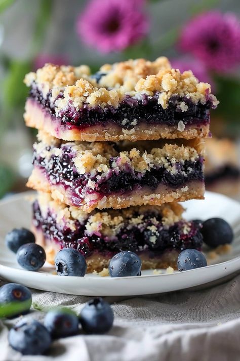 These blueberry crumble bars are the perfect balance of sweet and tangy. Featuring a buttery shortbread base, juicy blueberries, and a golden crumble topping, they're irresistible! Easy Blueberry Crumble, Blueberry Crumb Bars, Blueberry Crumble Bars, Blueberry Filling, Blueberry Bars, Crumb Bars, Shortbread Bars, Blueberry Crumble, Blueberry Desserts