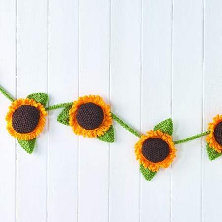 Sunflower Bunting | Free Knitting Patterns | Let's Knit Magazine Garland Knitting Pattern, Knitted Bunting Ideas, Knitted Sunflower Pattern Free, Knitted Bunting Free Pattern, Crochet Sunflower Garland Pattern Free, Sunflower Knitting Pattern, Sunflower Knitting, Knit Sunflower, Camper Decorating