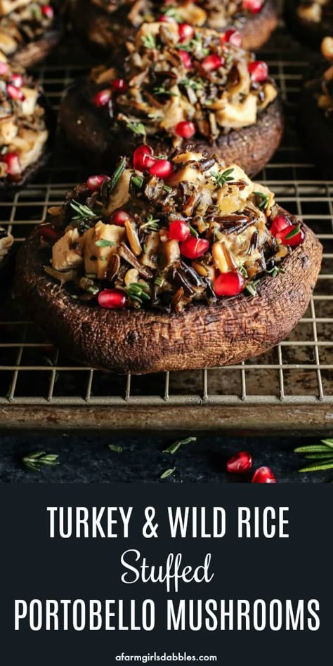 These Turkey Wild Rice Stuffed Portobello Mushrooms are all dressed up for the holidays. Giant mushroom caps are filled with a flavorful, lightly creamy mixture of wild rice and turkey. A sprinkling of fresh herbs and shiny, ruby-red pomegranate seeds are the final festive, delicious touch! Mushrooms Thanksgiving, Rice And Turkey, Stuffed Portobello Mushroom, Stuffed Portabella, Stuffed Portobello Mushrooms, Portobello Mushroom Recipes, Mushroom Vegetable, Stuffed Portobello, Mushroom Caps