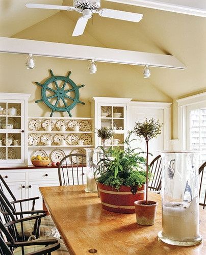 Decorating With A Ship Wheel Ship Wheel Decor, Cozy Coastal Cottage, Dark Counters, Nantucket Cottage, Beachy Stuff, State Decor, Nantucket Home, Dream Cabin, Ships Wheel