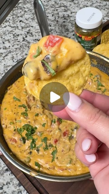 Breanna Stark on Instagram: "Smoked Brisket Queso just got easier with Ricos Gourmet Nacho cheese sauce! 🧀 #ricospartner 

Nothing says 🏈 FOOTBALL SEASON 🏈 quite like a pan of Brisket Queso and this recipes comes together in just about 15 minutes! 

Smoked Brisket Queso:
1lb smoked brisket, chopped 
½ cup diced tomatoes & green chiles 
2 cans @ricosproducts Gourmet Nacho 
⅛ cup chopped cilantro 

1. Warm up your smoked brisket in a pan over medium-low heat and add the diced tomatoes & green chiles. 
2. Add 2 cans of Ricos Gourmet Nacho cheese sauce and stir well. Let simmer for 7-10 minutes, or until it’s warm and creamy. 
3. Top with the cilantro and some Ricos Pickled Jalapeños & serve with Ricos Nacho Chips for dipping! 

#HowToNacho #smokedbrisket #queso #footballfood #gamedayfood # Brisket Queso, Queso Nachos, Brisket Nachos, Nacho Chips, Nacho Cheese Sauce, Green Chiles, Pickling Jalapenos, Smoked Brisket, Nacho Cheese