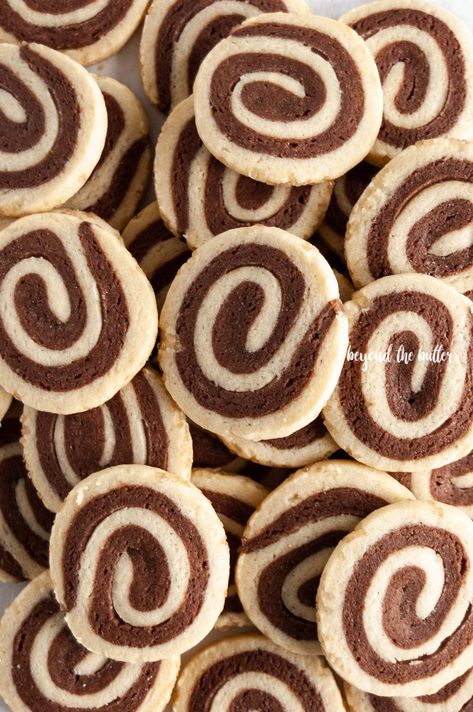 Chocolate Pinwheel Cookies are perfect to make over the holidays! They're a combination of chocolate cookie dough and vanilla cookie dough rolled together into a beautiful swirl, then rolled in demerara sugar for a bit of sweet crunchiness on the outside! They taste fantastic and a definite must make! | Recipe over on www.BeyondtheButter.com | #holidaycookies #pinwheelcookies #cookies #beyondthebutter Chocolate Pinwheel Cookies, Pinwheel Cookies Recipe, Pinwheel Cookies, Easy Christmas Cookie Recipes, Chocolate Cookie Dough, Soft Bakes, Molasses Cookies, Christmas Cookies Easy, Homemade Butter