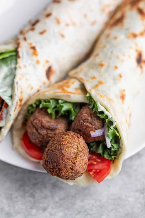 Homemade falafel is easier than you think! Using canned chickpeas and only a handful of ingredients, this easy falafel recipe is perfect for weeknights, with traditional fried and air-fryer directions. Easy Falafel Recipe, Easy Falafel, Falafel Recipe Easy, Homemade Falafel, Falafel Recipe, Red Onion Salad, Tahini Sauce, Pita Bread, Canned Chickpeas