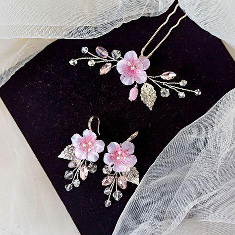 Cherry blossom jewelry set for bridal or bridesmaids. Sakura hair pin and earrings set silver, gold or rose gold color. Pink flower bridal accessory with leaves. Bridesmaids jewelry set for wedding with flowers and crystals. Matching hair comb : https://www.etsy.com/listing/1753734826/cherry-blossom-hair-comb-sakura-hair?click_key=d89f01e4d00cbc62545aab30fce71ae90142453e%3A1753734826&click_sum=3a88144d&ref=shop_home_active_10&pro=1 More items from my shop: https://www.etsy.com/shop/Jewelryforbri Sakura Accessories, Sakura Earrings, Sakura Hair, Cherry Blossom Jewelry, Sakura Wedding, Pink Jewelry Set, Clothing Pattern Design, Blossom Jewelry, Bridesmaids Jewelry