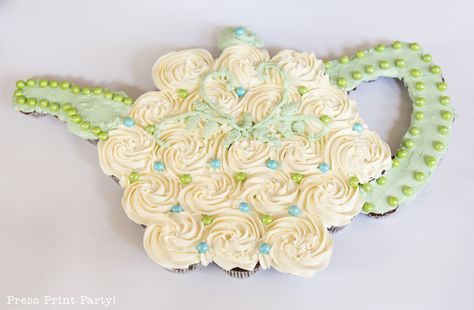 A teapot cupcake cake works great at tea parties. It looks like a teapot cake, but it's not as complicated to bake and put together. Download FREE template. Porter Cake, Tea Cup Cupcakes, Pull Apart Cakes, Edible Bowl, Horse Birthday Cake, Pull Apart Cupcake, Teapot Cake, Pull Apart Cupcake Cake, Pull Apart Cake