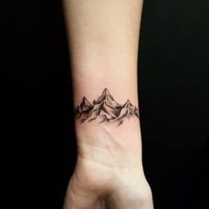 Wrist Mountain Tattoo, Alps Tattoo, Inner Wrist Tattoos Men, Mountain Tattoos For Women, Traveler Tattoos, Tattoo Above Knee, Moutain Tattoos, Small Mountain Tattoo, Inner Wrist Tattoos