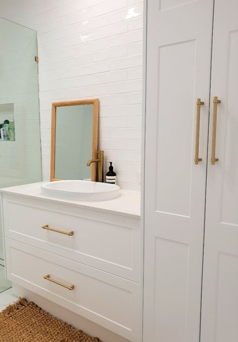 love our Shaker Lucca with the brass handles and tapware sitting alongside our shaker linen tower with White Truffle stone top and an oval inset basin
#classiquekitchens_vanities #bathroom #whitebathroom #shakerbathroom #hamptonstyle #hamptonsbathroom #shakercabinets #qldhomes #brisbanebathrooms Vanity Linen Tower, Shaker Linen Cabinet, Small Bathroom With Linen Cabinet, Single Sink Bathroom Vanity With Tall Side Cabinet, Bathroom Vanities With Storage Towers, Single Sink Vanity With Storage Tower, Vanity With Tall Side Cabinet, Bathroom Shaker Cabinets, Bathroom Vanity With Tall Side Cabinet