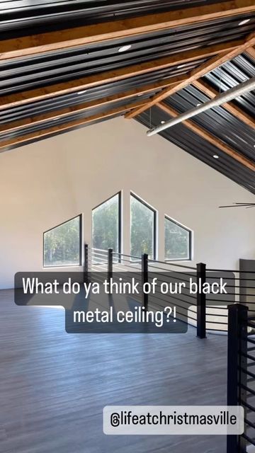 Black Corrugated Metal Ceiling, Steel Interior Walls, Metal Ceiling Barndominium, Metal Building Remodel, Rustic Metal Ceiling, Black Steel Ceiling, Black Ceiling Barndominium, Bedrooms With Black Ceiling, Black Metal Ceiling With Wood Beams