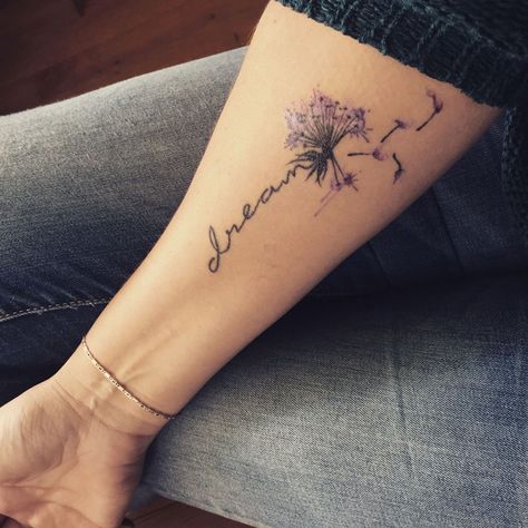 185+ Best Dandelion Tattoos Designs for Men and Women (2023) - TattoosBoyGirl Tattoo Dream Word, Living The Dream Tattoo, Dandelion Tattoo Quote, Watercolor Dandelion Tattoo, Dandelion Tattoo Meaning, Tattoo Dream, Meaningful Word Tattoos, Dandelion Tattoo Design, Go Tattoo