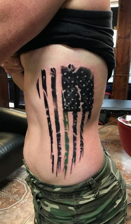 115 Patriotic American Flag Tattoos You Must See - Tattoo Me Now Army Veteran Tattoo, American Flag Neck Tattoo, Oif Veteran Tattoo, Flag Tattoo For Women, American Flag Tattoos For Women, Fighter Tattoo Woman, American Flag Rib Tattoo, American Tattoo Patriotic Women, Patriotic Tattoos For Women