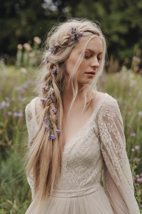 Discover the allure of effortlessly chic Boho wedding hairstyles that perfectly capture your free-spirited essence. This enchanting look features luscious waves adorned with delicate floral accents, creating a romantic and whimsical vibe that is ideal for any celebration. Perfect for a garden or beach setting, these wedding hairstyles embrace natural beauty while ensuring you radiate elegance on your special day. #weddinghairstyles #BohoBridal #BridalGlow Pagan Wedding Hairstyles, Fairytale Wedding Hair, Chic Boho Wedding, Boho Wedding Hairstyles, Cottage Core Wedding, Beach Setting, Embrace Natural Beauty, Boho Wedding Hair, Fairy Hair