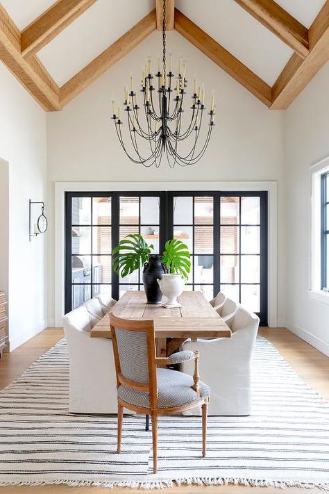 Erika Three Tier Chandelier, Chandelier Vaulted Ceiling Dining Room, Dining Room With Tall Ceilings, Vaulted Dining Room Ceiling, Dining Room Vaulted Ceiling, Vaulted Ceiling Dining Room, High Ceiling Dining Room, Vaulted Dining Room, Striped Dining Chairs