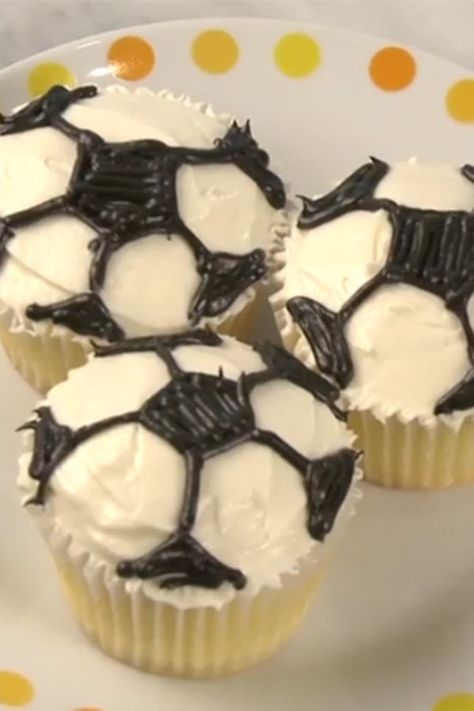 How to Decorate Soccer Cupcakes | "You can turn any cupcakes into little soccer balls. Perfect for watching the World Cup or to bring to your kid's soccer game as a treat." #cupcakerecipes #bakingrecipes #dessertrecipes #cupcakeideas Soccer Cupcakes, Soccer Snacks, Soccer Birthday Parties, Fun Decorations, Soccer Birthday, Allrecipes Recipes, Soccer Party, Soccer Game, Cupcake Frosting