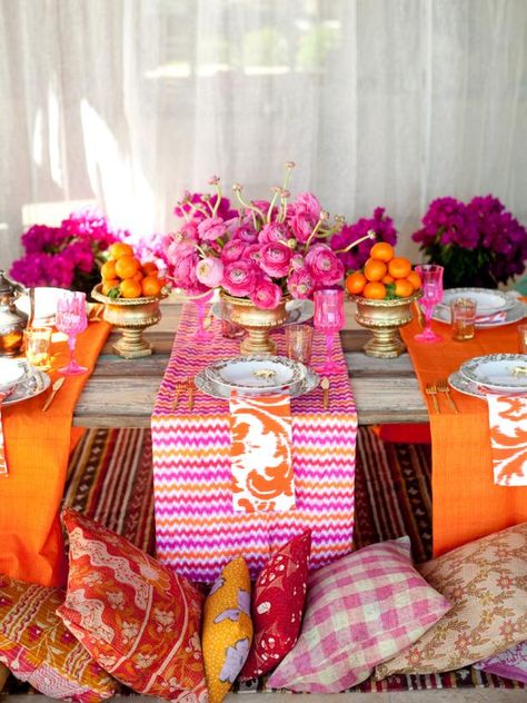 10 Theme Parties to Throw This Summer (Just Because) >> http://www.hgtv.com/design-blog/entertaining/10-summer-pool-party-ideas?soc=pinterest Fun Table Settings, Pink Table Settings, Moroccan Party, Table Rose, Bohemian Table, Exotic Wedding, Diy Wedding Table, Moroccan Theme, Tafel Decor