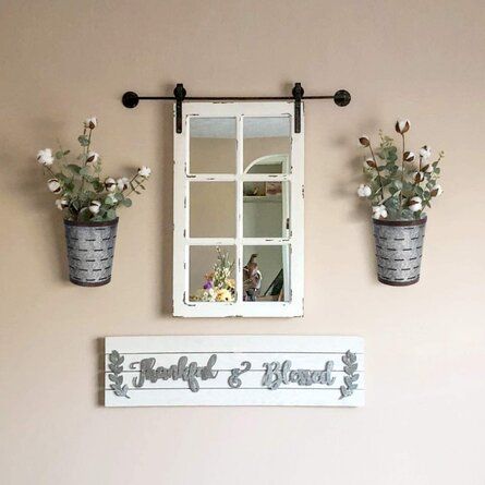 Galvanized metal wall plant container features an antique finish which can be hung on the wall to display for the world to see. This gorgeous piece is perfect for holding faux flowers and other decorative pieces. Super easy to hang and if they are kind of long for the flower stems, you can add some Bubble Cushion in the bottom. It will look generous on your wall. | Gracie Oaks Bernia Metal Wall Planter Metal in Gray, Size 8.5 H x 7.2 W x 5.7 D in | Wayfair Galvanized Wall Planter, Galvanized Wall, Hanging Wall Vase, Wall Flower Vases, Galvanized Metal Wall, Metal Wall Planters, Cotton Stems, Metal Bucket, Farmhouse Decor Living Room