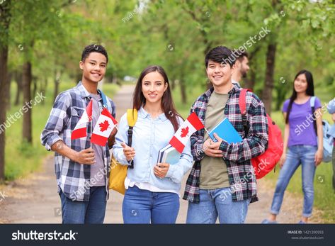 Group of students with Canadian flags outdoors images photo royalty free image photo Canadian Universities, Visa Canada, Immigration Canada, Student Awards, Study Program, Top Colleges, Canadian Flag, Scholarships For College, University Of Toronto