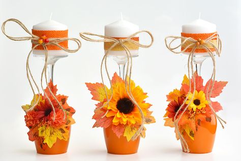 These DIY pumpkin wine glasses are SO PRETTY! Transform a simple wine glass into a pumpkin shaped candle holder. This homemade fall decor looks great on the mantle, or as part of a centerpiece on the Thanksgiving dinner table. Paint the inside of the wine glass orange to look like a pumpkin, and decorate it with fabric leaves and fall flowers. This seasonal decoration just screams autumn, and they're so easy to make! This post contains affiliate links. If you use these links to buy something ... Christmas Candle Holders Diy, One Little Project, Decorated Pumpkin, Fall Craft Fairs, Pumpkin Wine, Christmas Candles Diy, Wine Glass Candle Holder, Christmas Candle Holder, Pumpkin Candle Holder