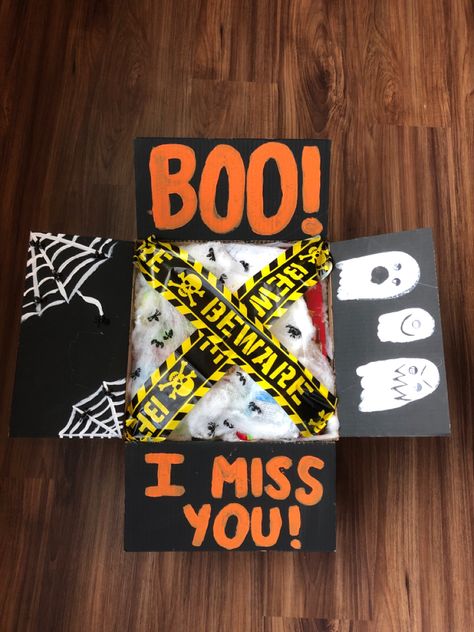 Boo Box For Boyfriend, Spooky Box Ideas, Girlfriend Halloween Basket, College Care Package Ideas Halloween, Boo Box Ideas, Halloween Deployment Care Package, Halloween Care Packages For College Kids, Halloween Care Package Ideas, College Gift Boxes