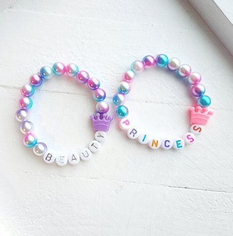 These super cute personalized bracelets are the perfect gift for any little girl who loves pretty jewelry! *Small beads not intended for Children 3 and under. Always supervise Children with bracelets. How to order 1) Select a Size 2)Select a Style  3)Add personalization Beaded Jewelry For Kids, Kids Beaded Jewelry, Kids Beads Bracelets, Barbie Jewelry For Women, Kids Bracelets Diy, Kids Beaded Bracelets, Kid Bracelets, Beads Bracelet Ideas, Kid Jewelry