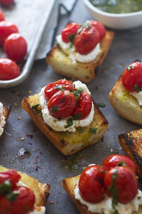 Grilled Baguette with Homemade Ricotta, Burst Cherry Tomatoes, and Chimichurri is a quick lunch or light dinner for spring. So full of flavor with fresh garlic Chimichurri, the soft ricotta, and roasted tomatoes all on grilled bread.  A fun meal to make together with the kids! #homemadericotta #chimichurrri #springmeal Goat Cheese Bruschetta, Burst Cherry Tomatoes, Cheese Bruschetta, Curd Cheese, Simple Appetizer, Homemade Ricotta, Ricotta Toast, Grilled Bread, Bruschetta Recipe