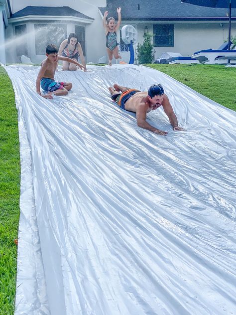 At Home Slip And Slide, Huge Slip And Slide, Home Made Slip And Slide, Slip N Slide Aesthetic, Tarp Slip N Slide, Adult Slip And Slide Party, Diy Slip N Slide, Backyard Slip And Slide, Slip N Slide Party