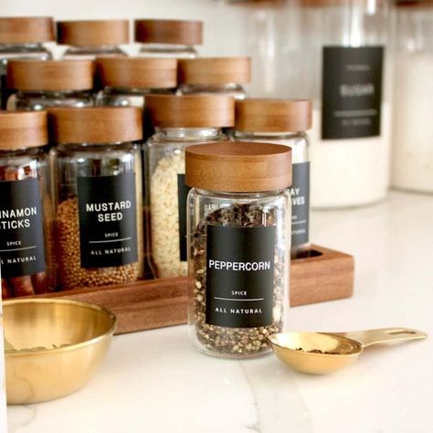 Tired of toppling jars, outdated spices, and buying duplicates? Then this post is for you! Find ways to organize spices in the pantry, a drawer, on the counter, and more with these kitchen organizing ideas & tips! Spices Jars Ideas, Black And Bamboo Kitchen Decor, Black Spice Labels, Labels For Spices, Black And Wood Pantry Organization, Spice Containers Ideas, Modern Farmhouse Kitchens Black, Pantry Label Ideas, Pantry Spice Organization