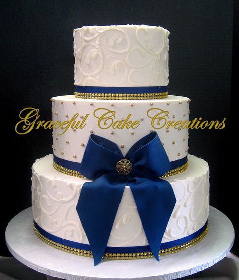 https://flic.kr/p/QPeRpc | Elegant Ivory Butter Cream Wedding Cake with Gold Sugar Pearls and Navy Blue Ribbon and Bow with Gold Bling Wedding Cake Elegant Gold, Blue And Gold Cake, Royal Blue Wedding Cakes, Navy Blue Wedding Cakes, Cream Wedding Cakes, Wedding Cake Navy, Wedding Cakes Elegant, Quinceanera Cakes, Traditional Wedding Cake