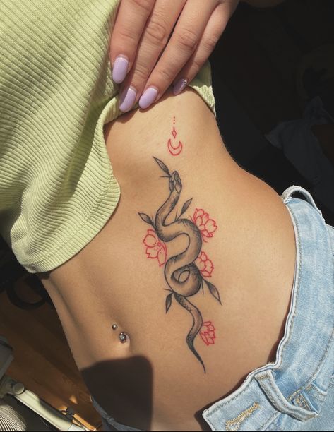 Snake tattoo and flowers Tattoo Lower Leg Woman, Snake And Tulip Tattoo, Snake Tattoos Rib Cage, Snake Tattoo Between Breast, Snake Tattoo With Flowers, Snake With Flowers Tattoo, Snake Flower Tattoo, Snake And Flowers Tattoo, Underboob Tattoos