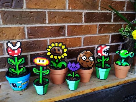 Plants vs. Zombies Pots! Other designs available upon request! Perler Plants, Pixel Plants, Perler Bead Designs, Perler Beads Ideas, Perler Crafts, Diy Perler Beads, Melting Beads, Iron Beads, Plants Vs Zombies