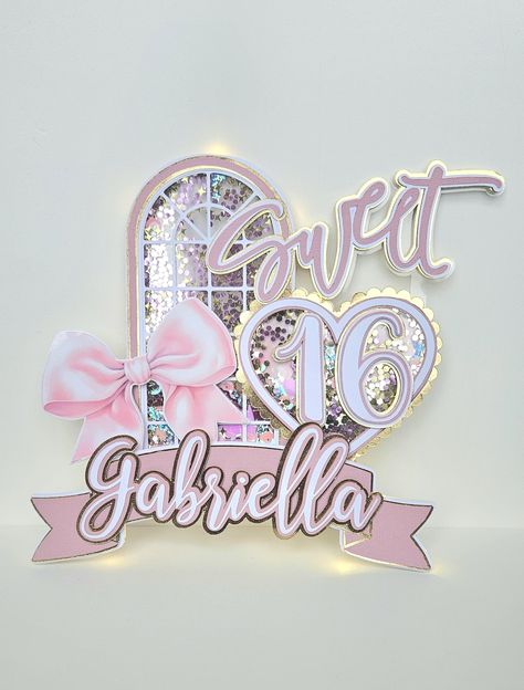 Coquette 3D Cake Topper Shaker  |  Sweet 16 Birthday Cake Topper | Sweet sixteen Cake Topper | Coquette Bday Supplies | Coquette Bday Decor Full color custom 3D Ccoquette/ Sweet Sixteen Cake Topper Shaker. Beautiful Coquette Cake Topper Shaker with Fairy Ligths,  with several layers filled with confetti is made to order and/or fully customizable.  Items Details: *Cake Topper Shaker. * Size: 10 W X 8.20 H inches approx. (Dimensions may vary). *Listing is for a finish product. *Our Cake toppers ar Coquette Bday, Sweet Sixteen Cake Topper, Sweet 16 Cake Topper, Coquette Cake, Sweet 16 Cupcakes, Coquette Party, Sweet Sixteen Cakes, Bday Decor, Sweet 16 Birthday Cake