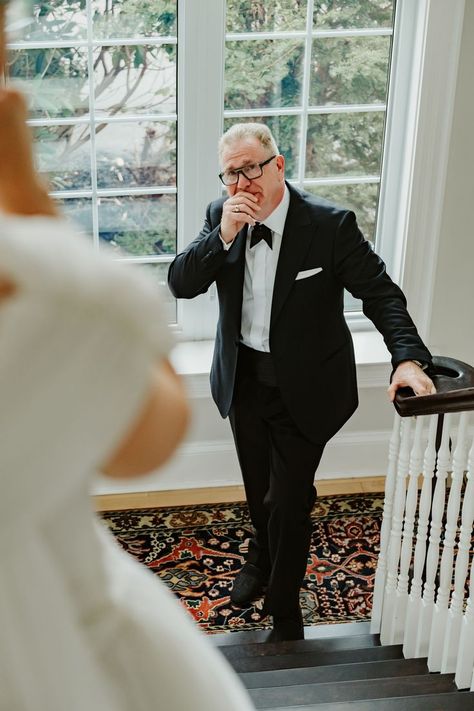 Dad in tuxedo holds his hand to his mouth, holding back tears as he looks up the stairs at his daughter in her wedding dress. Father Daughter Pictures, Father Daughter First Look, Father Daughter Wedding, Nova Scotia Wedding, Wedding Photo List, Canadian Wedding, Father Photo, Family Wedding Photos, Wedding Portrait Poses