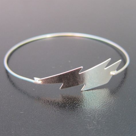 Lightning Bolt Bracelet, Lightning Bolt Jewelry, Weather Jewelry, Cartoon Jewelry, Lightning Bangle, Lightning Bracelet, Lightning Jewelry. $15.95, via Etsy. Lightning Bolt Jewelry, Silver Bangle Bracelets, Lightning Bolt, Sterling Silver Bands, Silver Band, Custom Jewelry, Bangle Bracelets, Silver Bracelet, Silver Tone