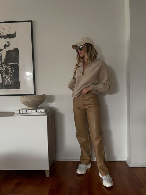 Vegan leather pant. Button and zipper fly. Four pocket construction. Fully lined. Style #: A1196P Material: PU/Cotton Color: Tan Model is wearing a small MODEL STATS: Height: 5'4" / Bust: 32A / Jeans: 24 Also pictured: New England Crop Sweater, Big City Trench Coat Winter Outfit Baddie, Teen Spring Outfits, Winter Outfits Black, Baddie Winter Outfits, Everyday Outfits Fall, Chasing Pavements, Tan Outfit, Girl Baddie, Outfit Baddie