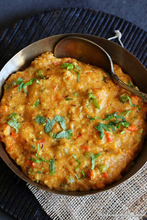 Are you looking for a simple, quick recipe with millet and legumes? Then try this Bhaidku – A traditional and ancient meal recipe from Gujarat. It is easy to digest, rich in plant protein and fiber, and is a family’s favorite meal recipe. #gujarairecipe #milletrecipe Protein Indian Food, Savory Millet Recipes, Gujarati Breakfast Recipes, Pearl Millet Recipes, Millet Recipes Indian, Millets Recipes Indian, Mirliton Recipes, Millet Dishes, Millet Soup