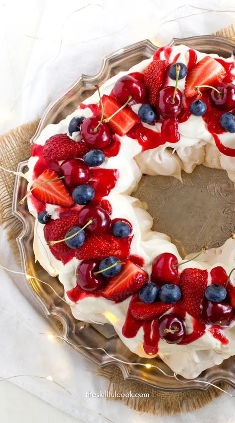 Christmas Wreath Pavlova,Pavlova Recipe Christmas,Christmas Merengue,Holiday Pavlova,Holiday Meringues Holiday Pavlova, Holiday Meringues, Christmas Cream Puffs, Wreath Pavlova, Christmas Pavlova Wreath, Pavlova Wreath, Meringues Recipe, Christmas Pavlova, Christmas Reef