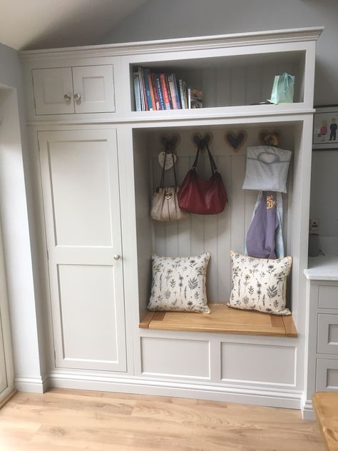 Hallway storage cupboard including shoe box and coat hooks with love heart feature. Feature Hallway, Hallway Coat Storage, Coat Cupboard, Hallway Cupboards, Utility Room Designs, Porch Interior, Hall Cupboard, Entrance Interior Design, Porch Storage